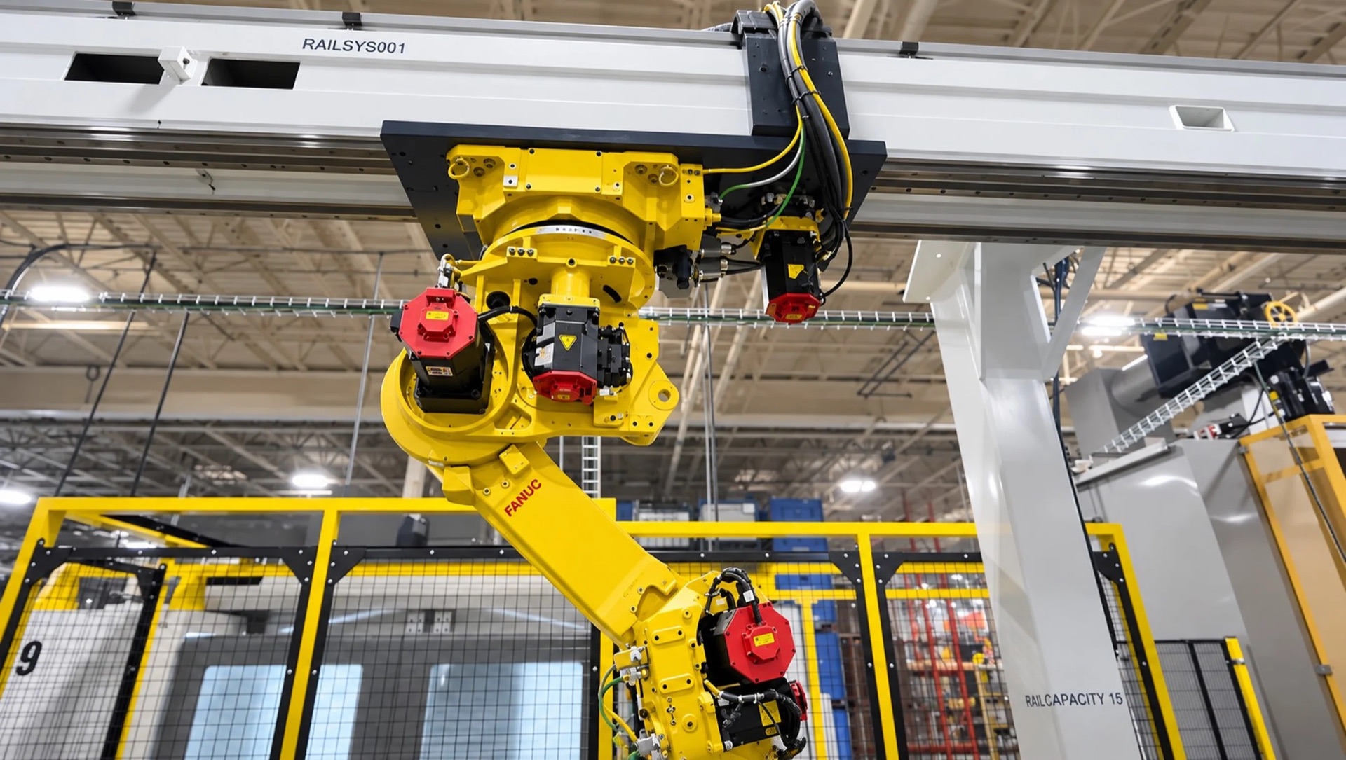 FANUC robot on an overhead rail system in a Michigan manufacturing facility