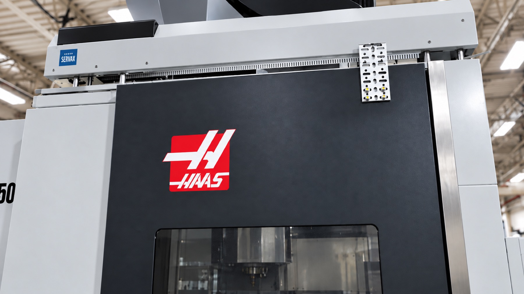 Servak auto door on a Haas mill