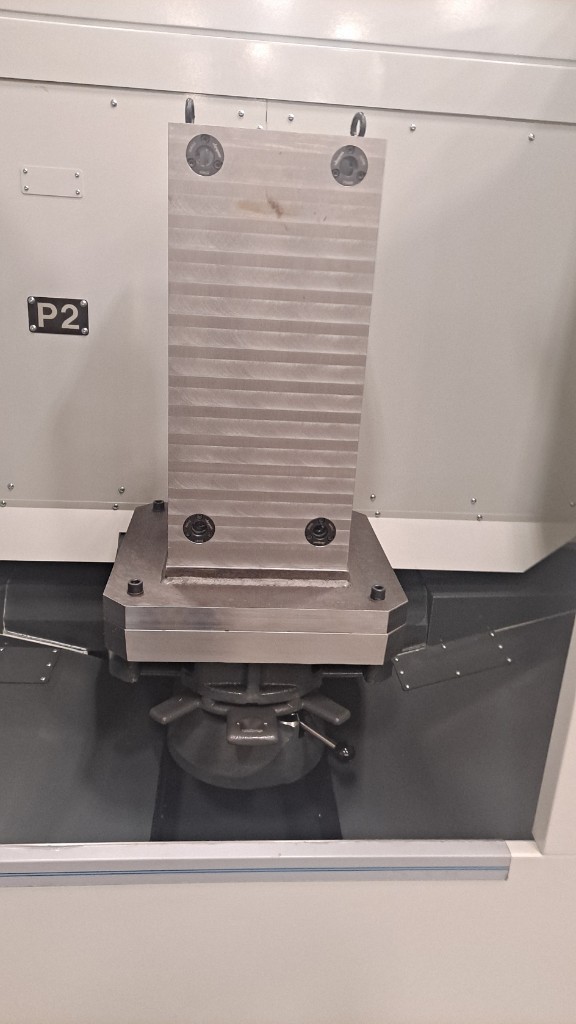 Serrated tombstone fixture plate marked P2
